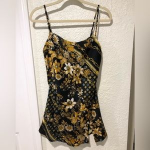 Princess Polly women’s size 4 mini dress with small slit in front.